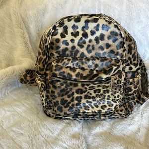 Cute studded animal print backpack purse